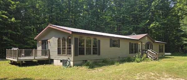10 Acres of Land with Home for Sale in Mancelona, Michigan