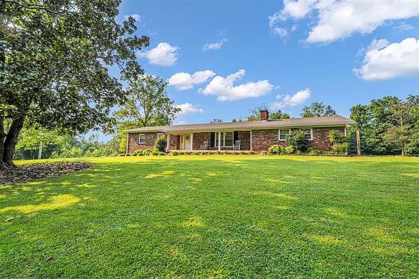 5.66 Acres of Land with Home for Sale in Scottsville, Kentucky