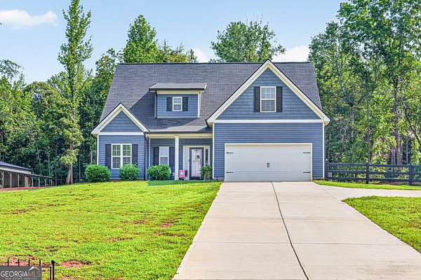 3.28 Acres of Land with Home for Sale in Commerce, Georgia