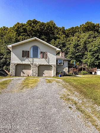 6.5 Acres of Land with Home for Sale in Altoona, Pennsylvania