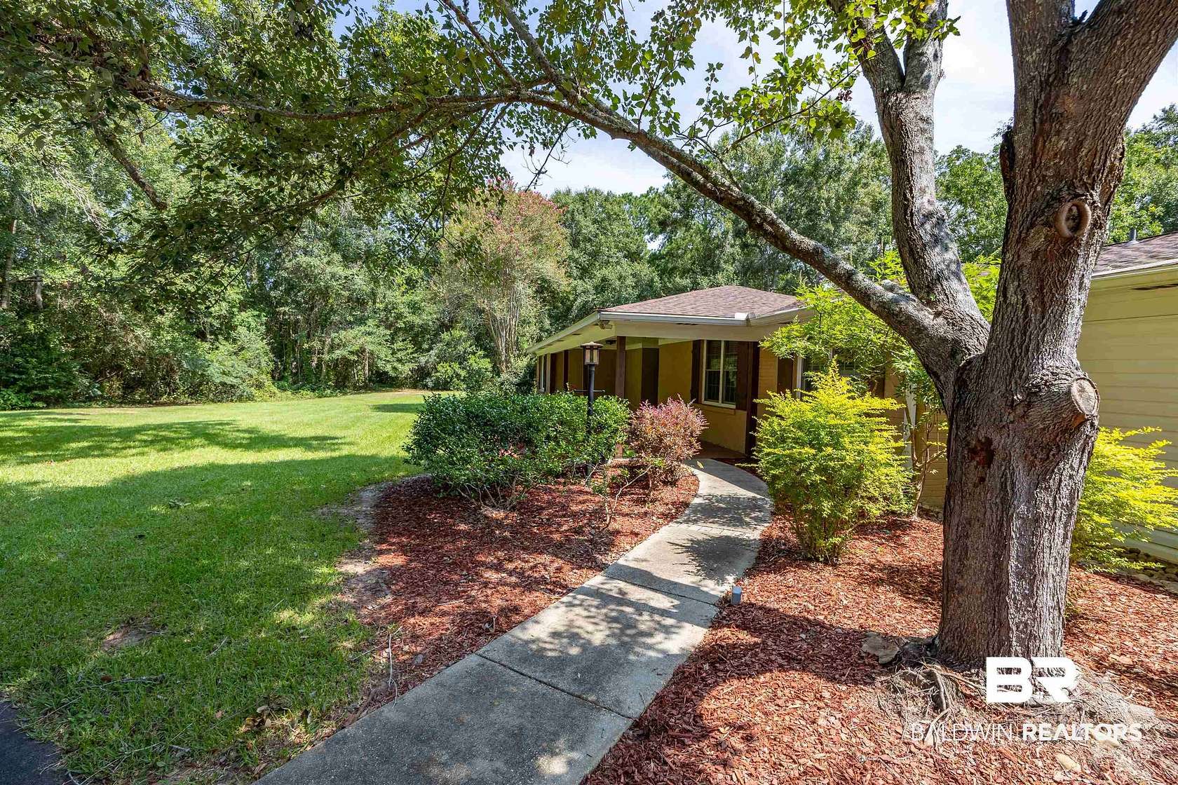 4.89 Acres of Land with Home for Sale in Theodore, Alabama