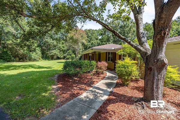4.89 Acres of Land with Home for Sale in Theodore, Alabama