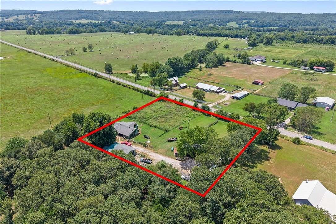 2 Acres of Land with Home for Sale in Elkins, Arkansas