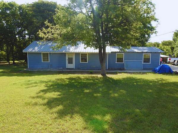 2.48 Acres of Land with Home for Sale in Quinlan, Texas