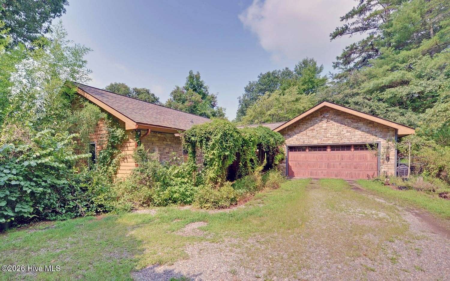 9.17 Acres of Land with Home for Sale in Brasstown, North Carolina