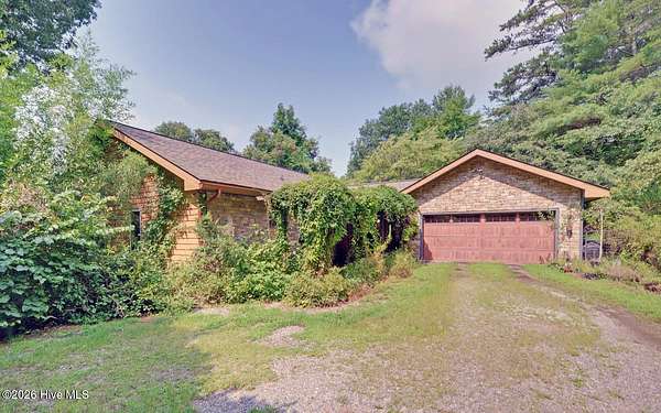 9.17 Acres of Land with Home for Sale in Brasstown, North Carolina