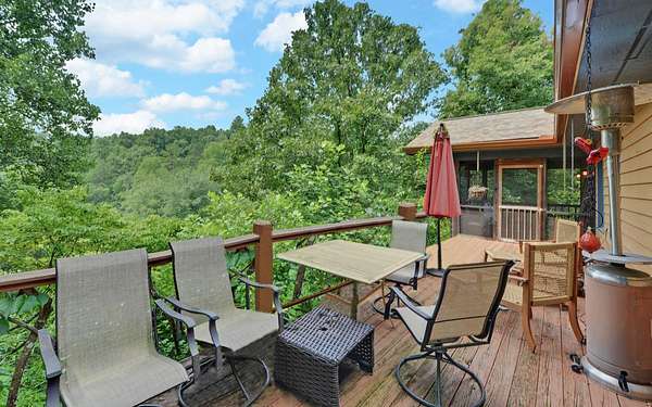 9.17 Acres of Land with Home for Sale in Brasstown, North Carolina