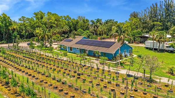 5.74 Acres of Land with Home for Sale in Loxahatchee Groves, Florida