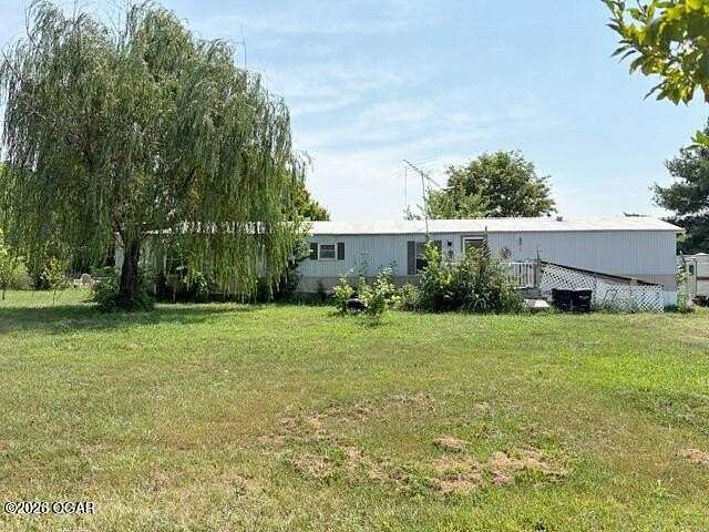 5 Acres of Land with Home for Sale in Reeds, Missouri