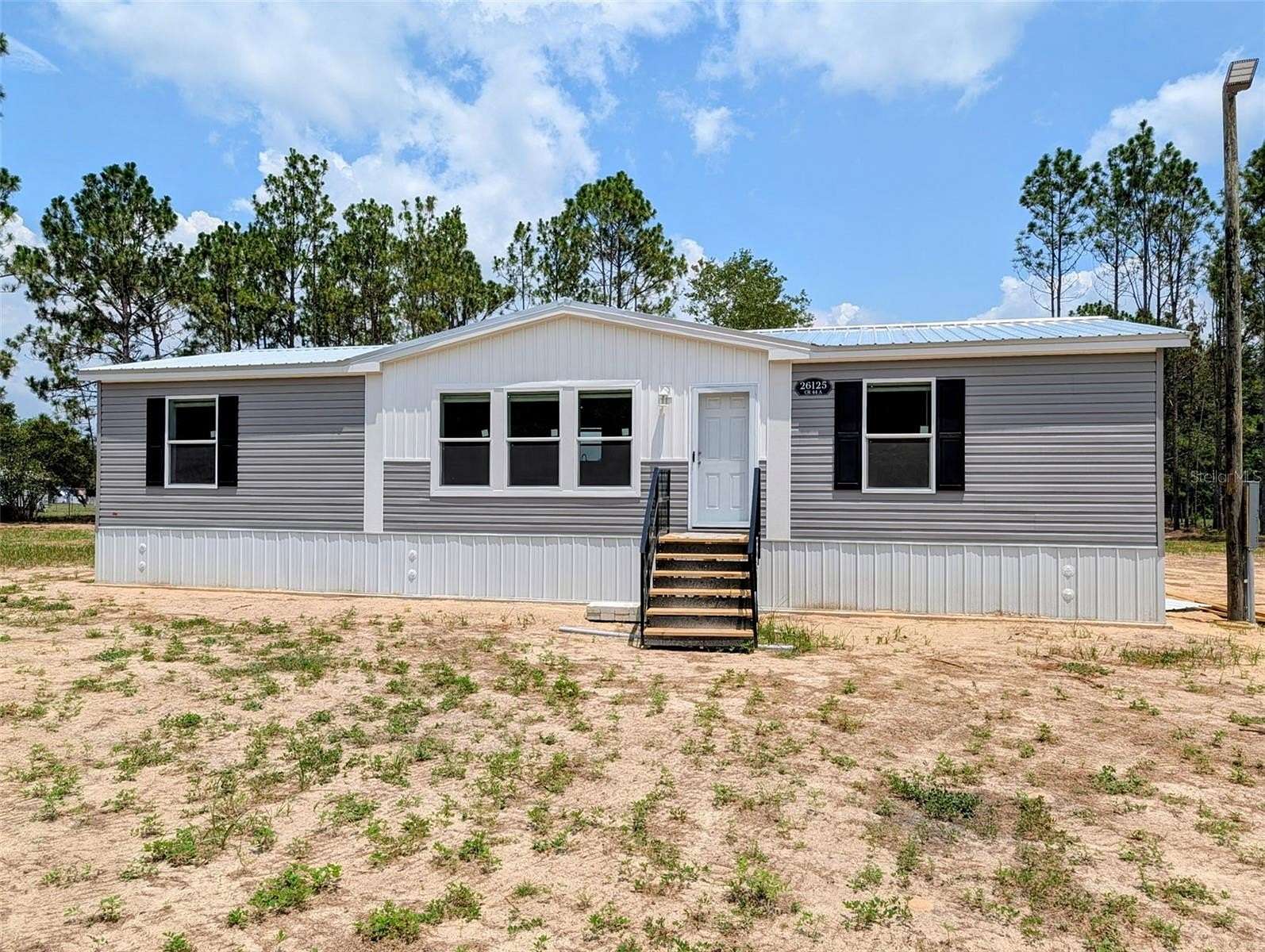 7.22 Acres of Land with Home for Lease in Eustis, Florida