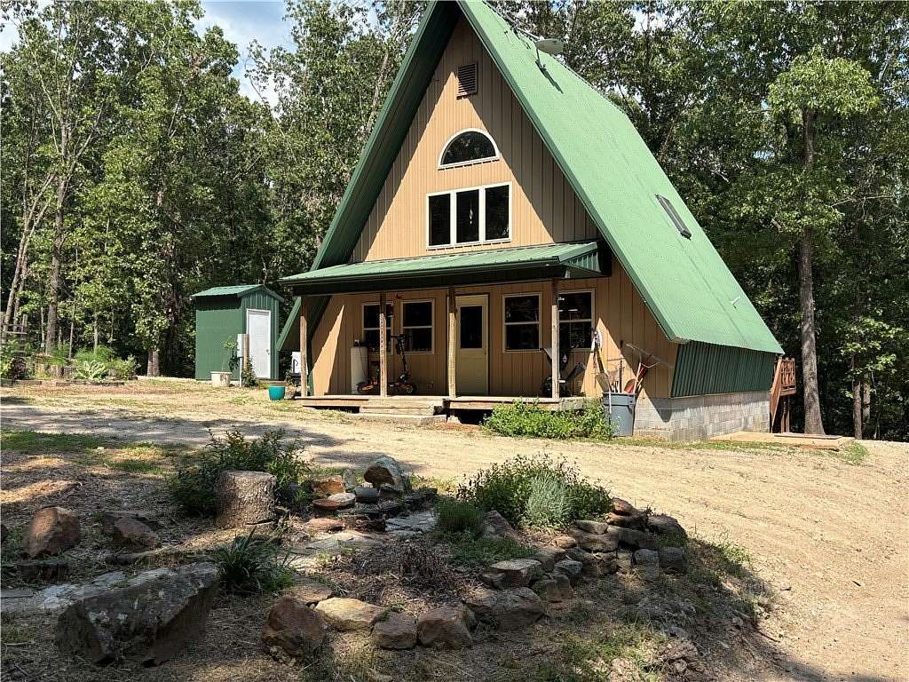 10 Acres of Land with Home for Sale in Green Forest, Arkansas
