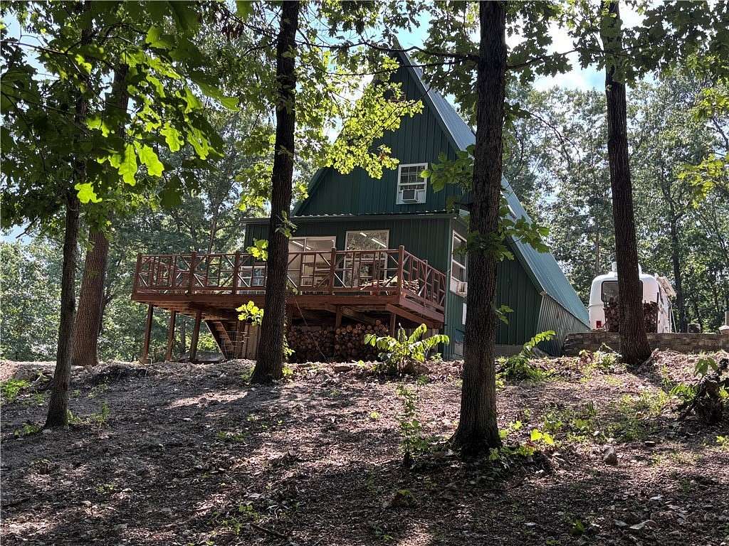 10 Acres of Land with Home for Sale in Green Forest, Arkansas