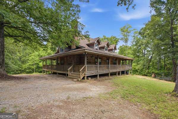 10 Acres of Land with Home for Sale in Cave Spring, Georgia