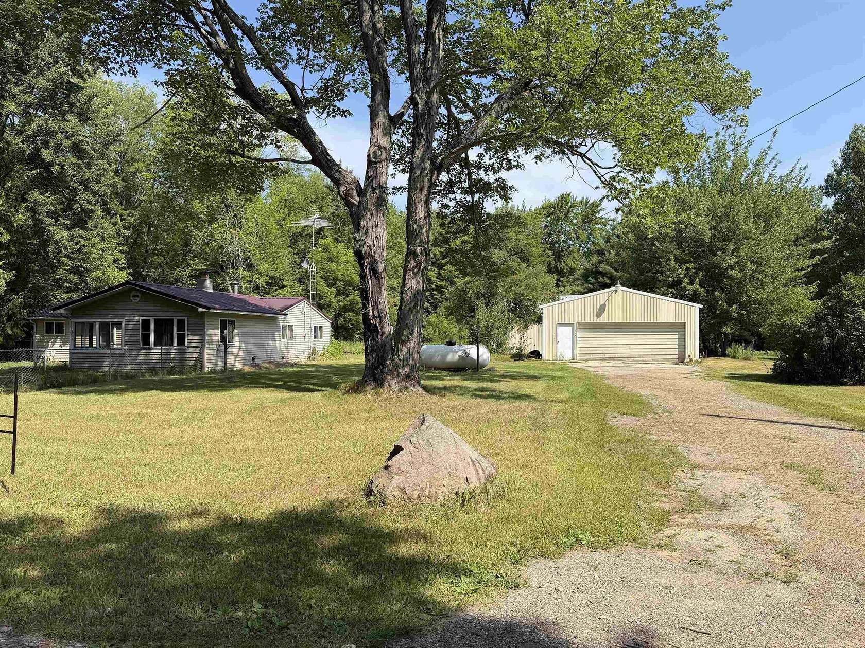 1.84 Acres of Land with Home for Sale in Harrison, Michigan