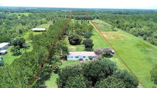 10.4 Acres of Land with Home for Sale in Frostproof, Florida