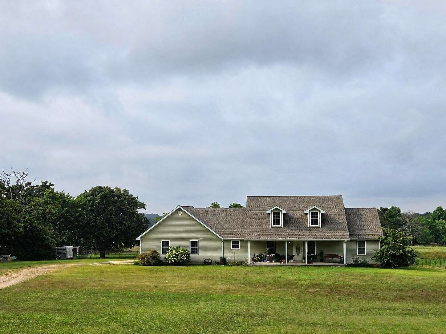 32 Acres of Agricultural Land with Home for Sale in West Plains, Missouri