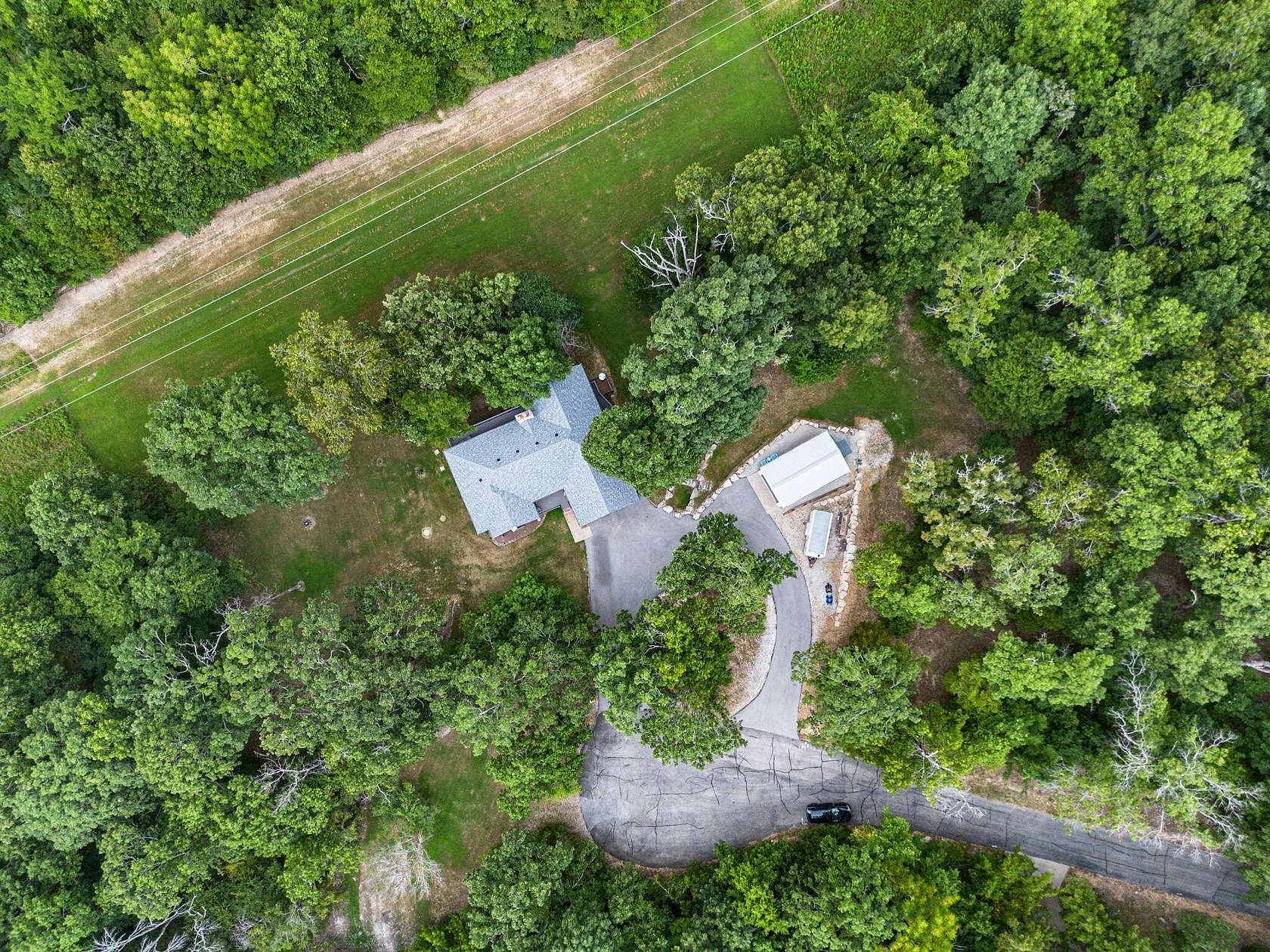4.18 Acres of Land with Home for Sale in Kimberling City, Missouri