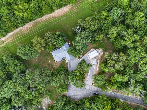 4.18 Acres of Land with Home for Sale in Kimberling City, Missouri