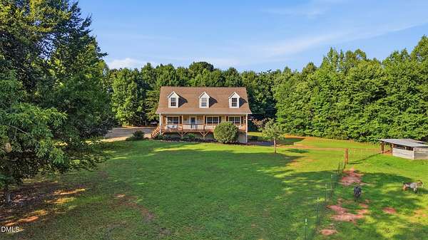 11.8 Acres of Recreational Land with Home for Sale in Gibsonville, North Carolina