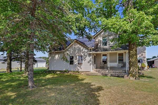 2 Acres of Land with Home for Sale in Coral, Michigan
