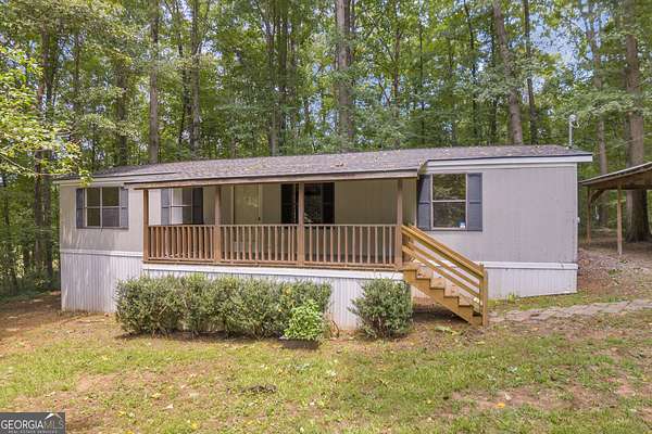 2.77 Acres of Land with Home for Sale in Commerce, Georgia
