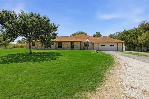 9.47 Acres of Land with Home for Sale in Ponder, Texas