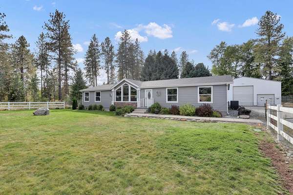 9.15 Acres of Land with Home for Sale in Elk, Washington