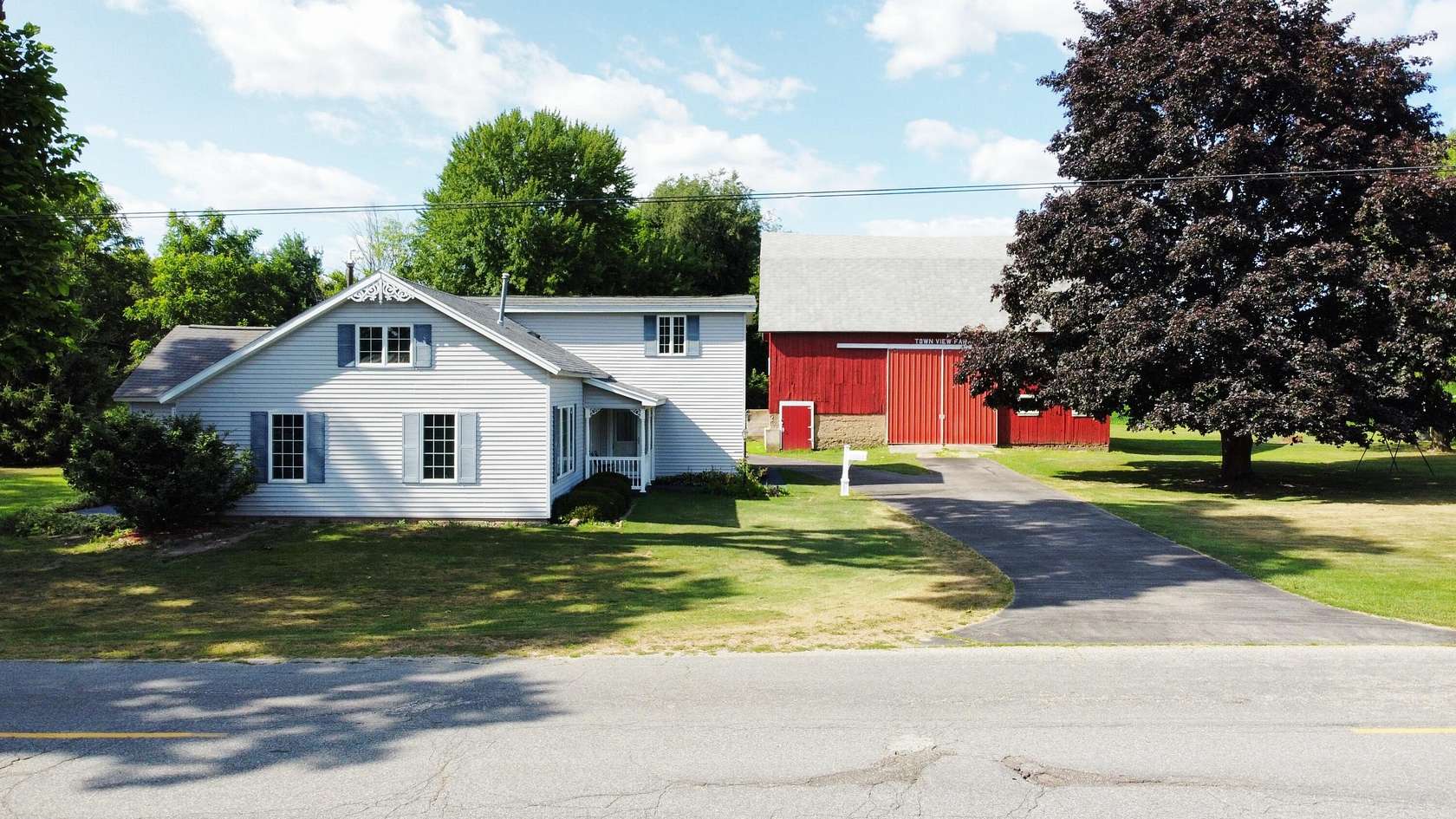 1.5 Acres of Land with Home for Sale in Edmore, Michigan