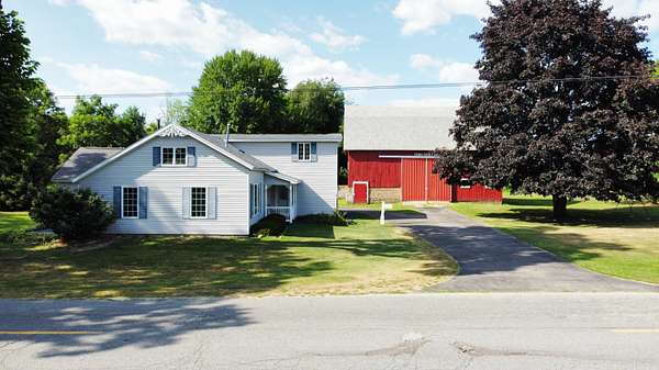 1.5 Acres of Land with Home for Sale in Edmore, Michigan