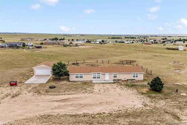 2.55 Acres of Land with Home for Sale in Peyton, Colorado