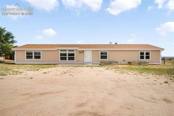 2.55 Acres of Land with Home for Sale in Peyton, Colorado