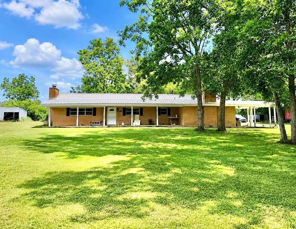 1.59 Acres of Land with Home for Sale in Carriere, Mississippi
