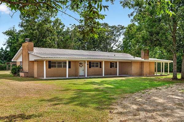 1.59 Acres of Land with Home for Sale in Carriere, Mississippi