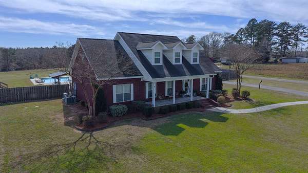 7.2 Acres of Land with Home for Sale in Andalusia, Alabama