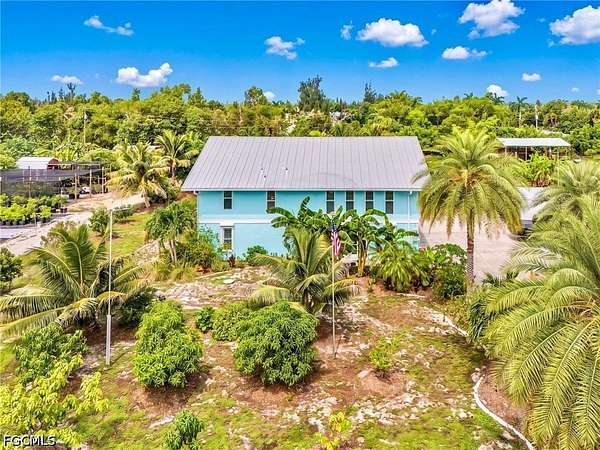 2.6 Acres of Land with Home for Sale in Bokeelia, Florida