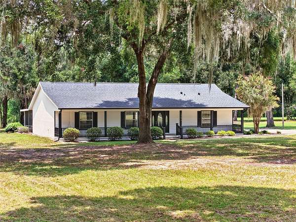 8.88 Acres of Land with Home for Sale in Ocklawaha, Florida