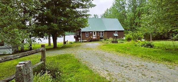 5.3 Acres of Land with Home for Sale in Corinna, Maine