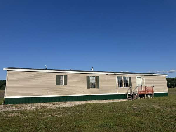 3.1 Acres of Land with Home for Sale in Levering, Michigan