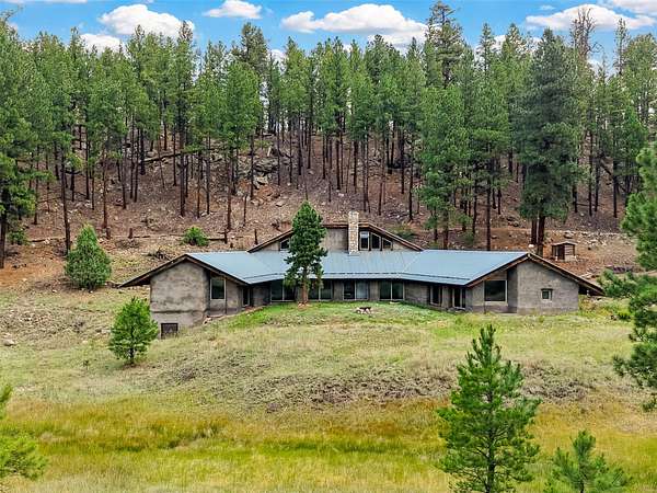 29 Acres of Land with Home for Sale in Jemez Springs, New Mexico