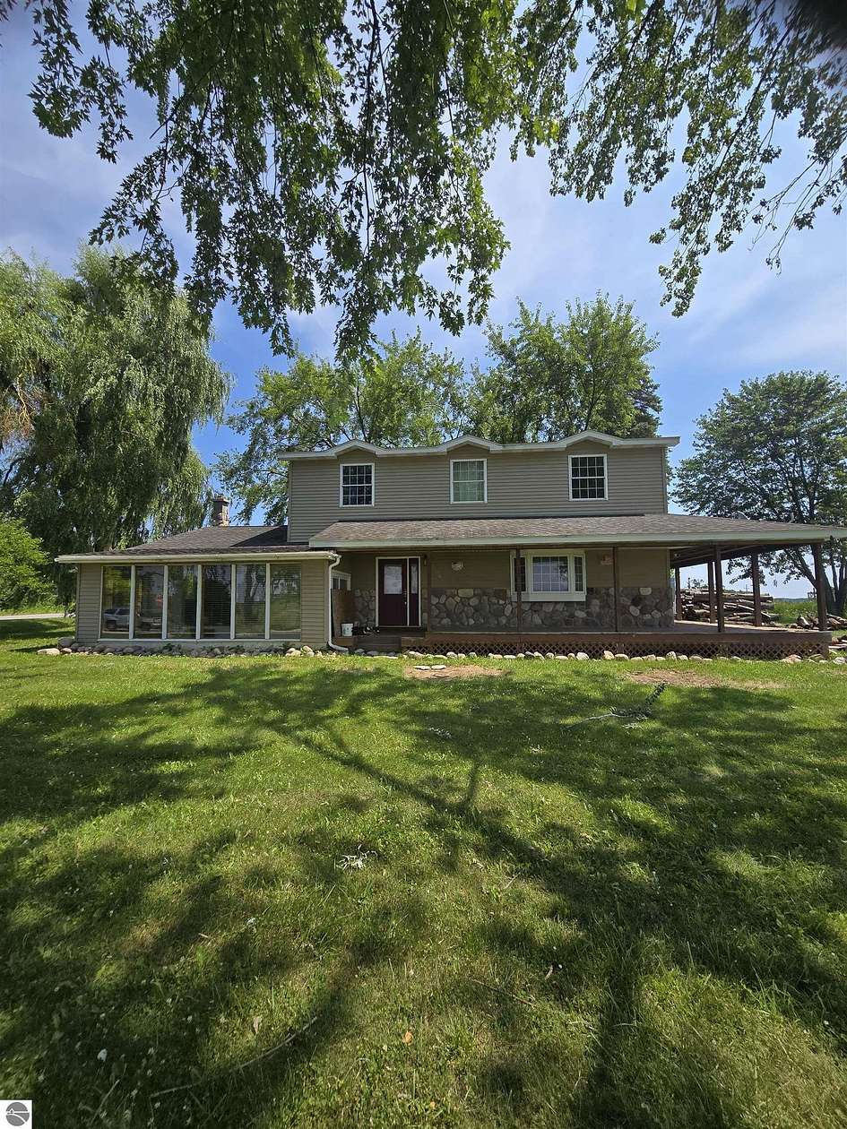 2 Acres of Land with Home for Sale in Harrisville, Michigan
