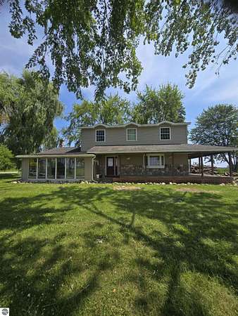 2 Acres of Land with Home for Sale in Harrisville, Michigan