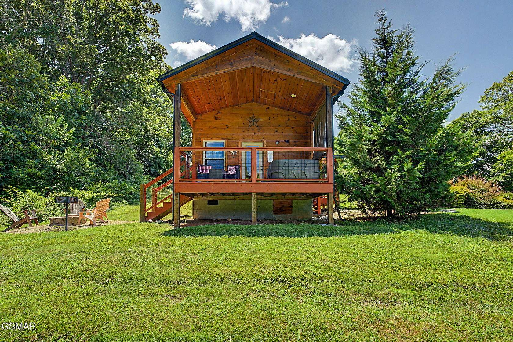 6.78 Acres of Land with Home for Sale in Sevierville, Tennessee