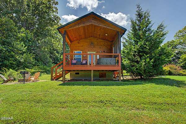 6.78 Acres of Land with Home for Sale in Sevierville, Tennessee