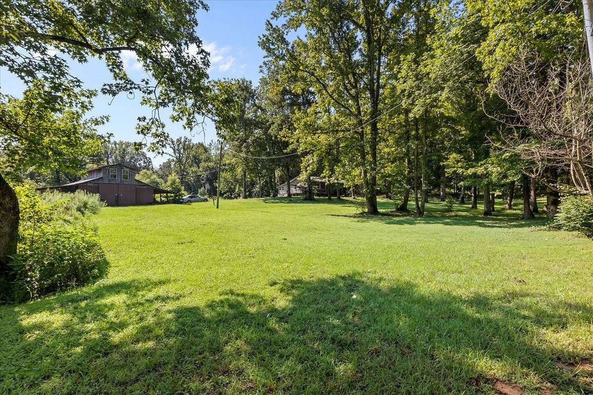 54.6 Acres of Recreational Land with Home for Sale in Huntingdon, Tennessee