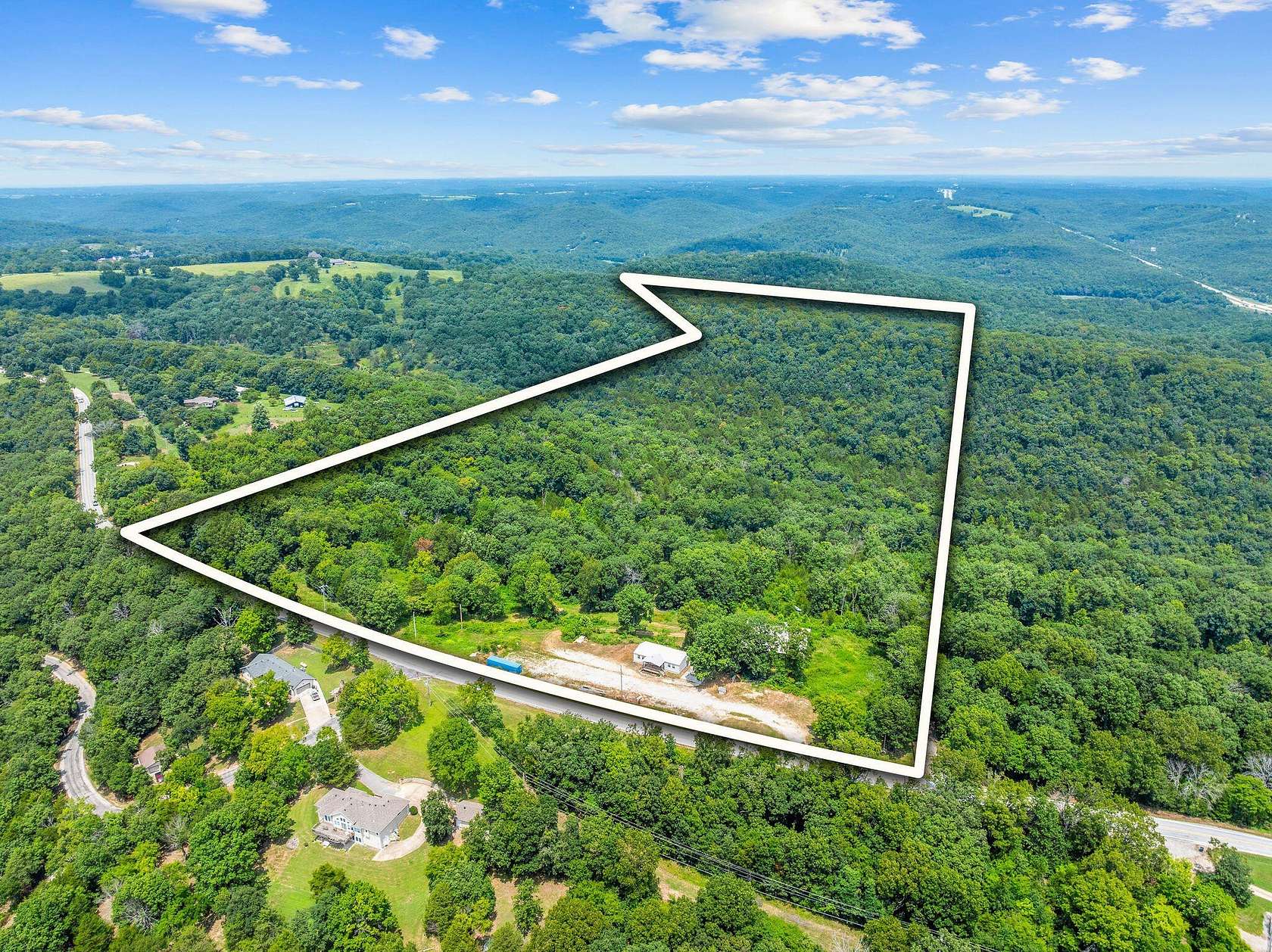 44.3 Acres of Recreational Land with Home for Sale in Walnut Shade, Missouri