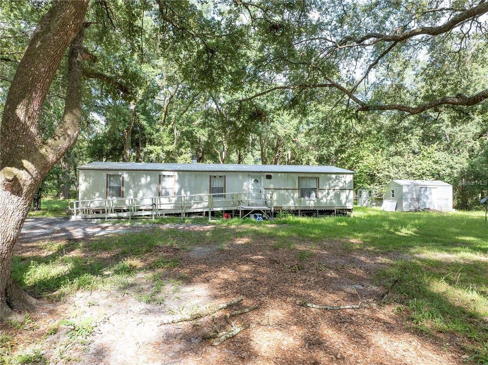 2.89 Acres of Land with Home for Sale in Lake City, Florida