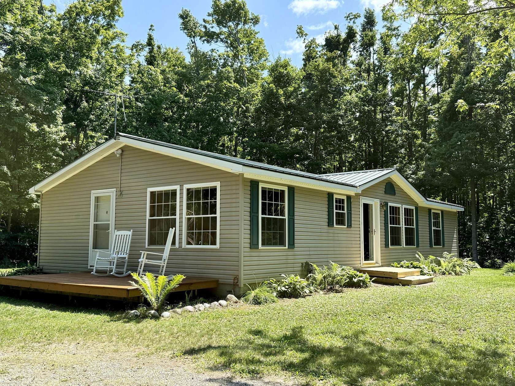 10 Acres of Land with Home for Sale in Vanderbilt, Michigan