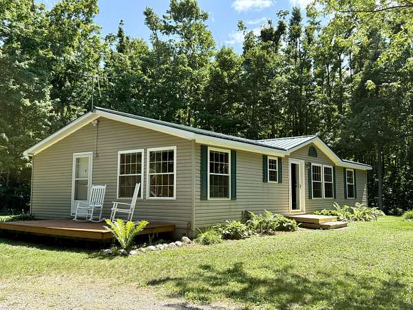 10 Acres of Land with Home for Sale in Vanderbilt, Michigan