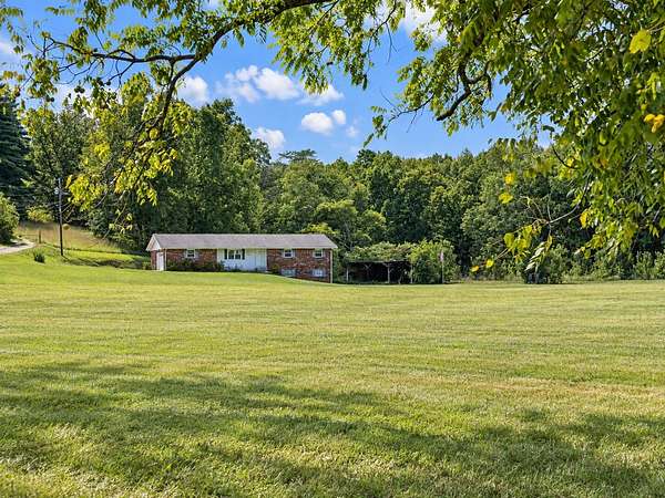 6.4 Acres of Land with Home for Sale in Soddy-Daisy, Tennessee
