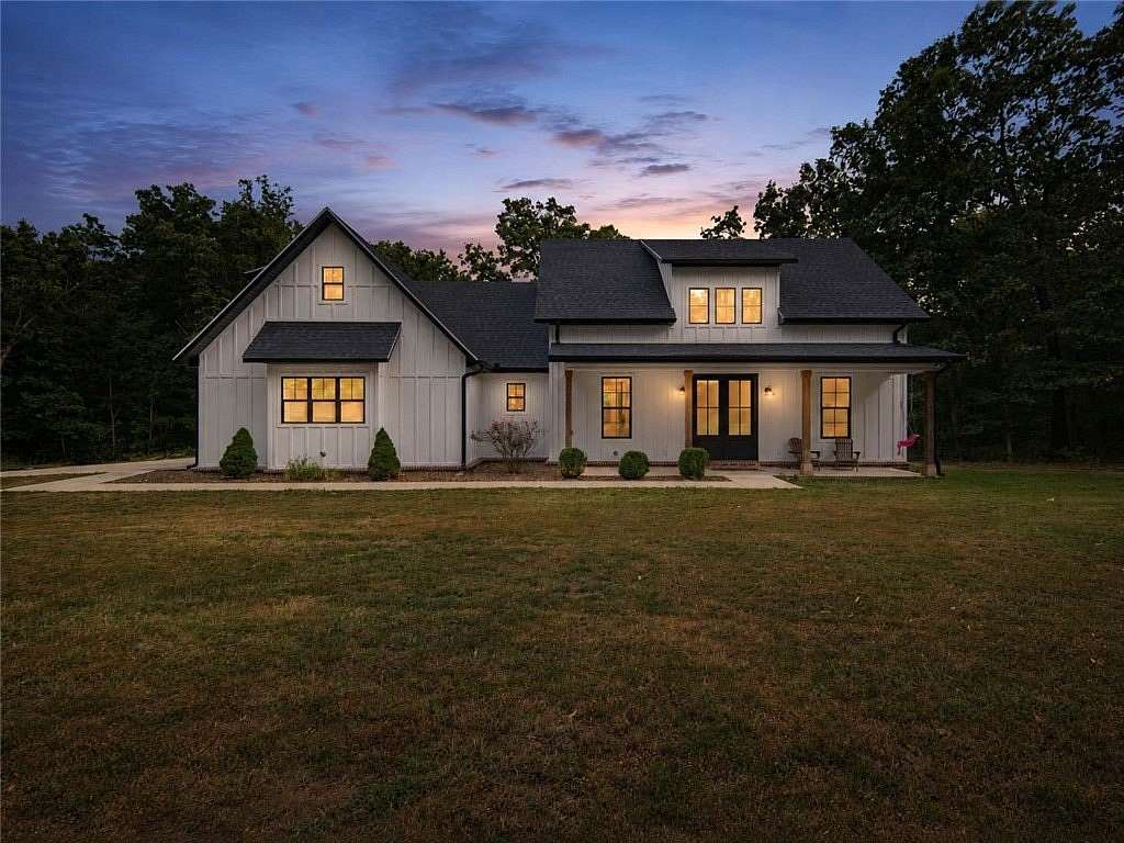 8.39 Acres of Land with Home for Sale in Gravette, Arkansas